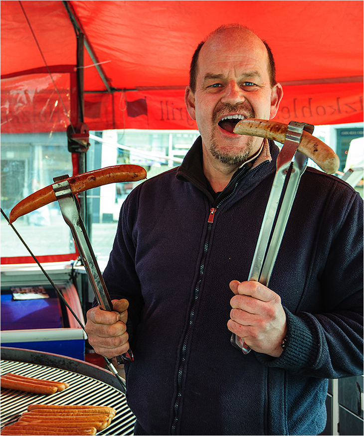 Man with large sausage